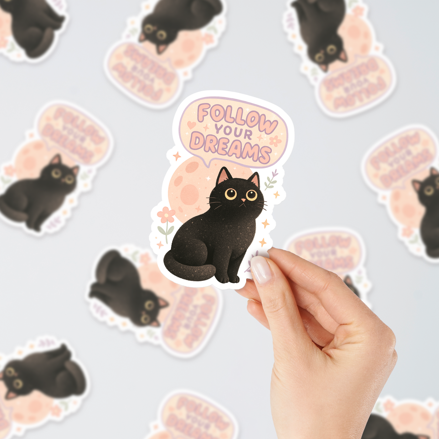 Black cat sticker with “Follow Your Dreams” text – durable vinyl sticker for laptops, water bottles, journals, and aesthetic decor.