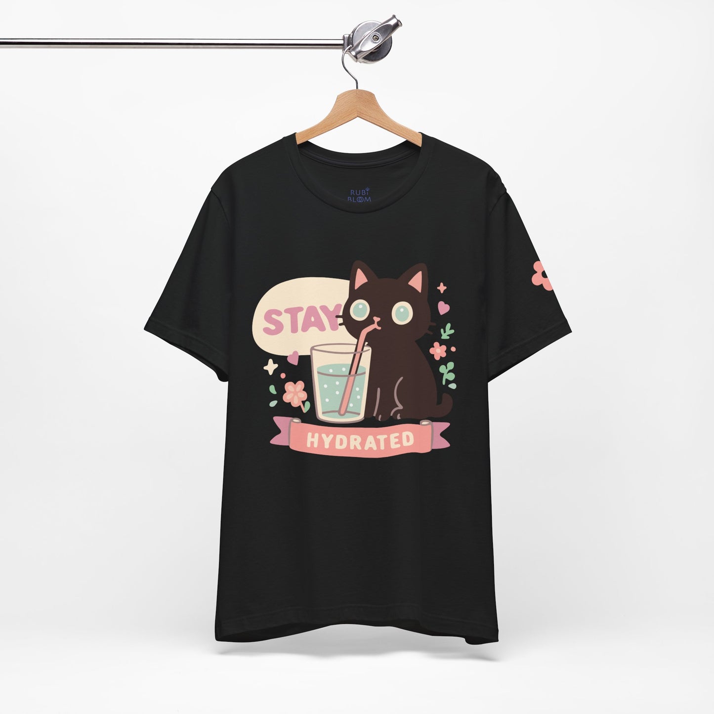 Black “Stay Hydrated” cat t-shirt — cute aesthetic tee with pastel print and pink banner, cozy minimalist outfit for creative souls.