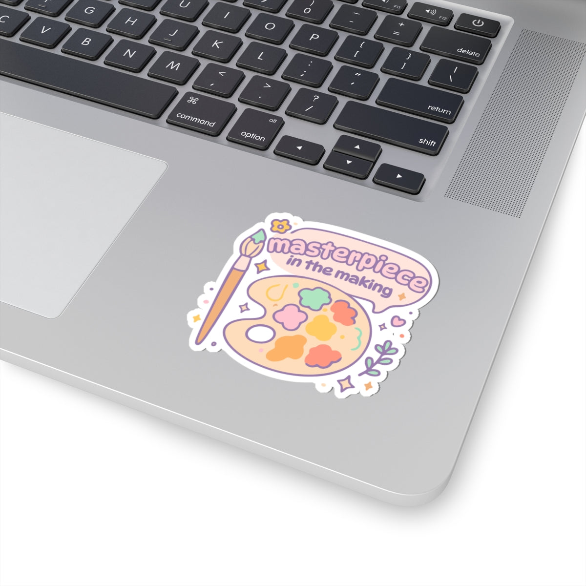 Small 3x3 inch Masterpiece in the Making vinyl sticker on laptop, waterproof pastel artist palette design, perfect for decorating journals, sketchbooks, or tech.