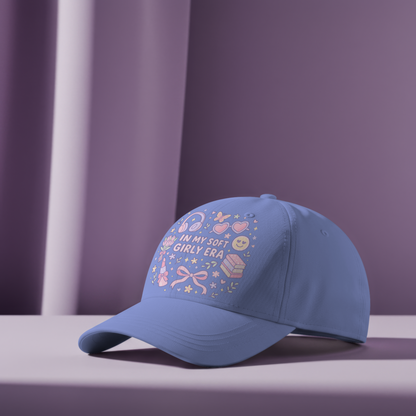 Close-up of a pastel blue baseball cap featuring the “In My Soft Girly Era” PNG design. Cute digital illustration printed on hat, showing how printable SVG files can be used for apparel and cozy accessories.
