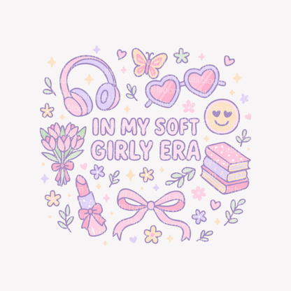 Pastel pink and purple printable illustration with text “In My Soft Girly Era”, surrounded by cute doodles like headphones, hearts, bows, flowers, books, and lipstick. Dreamy soft girl aesthetic PNG and SVG digital design for cozy prints and apparel.
