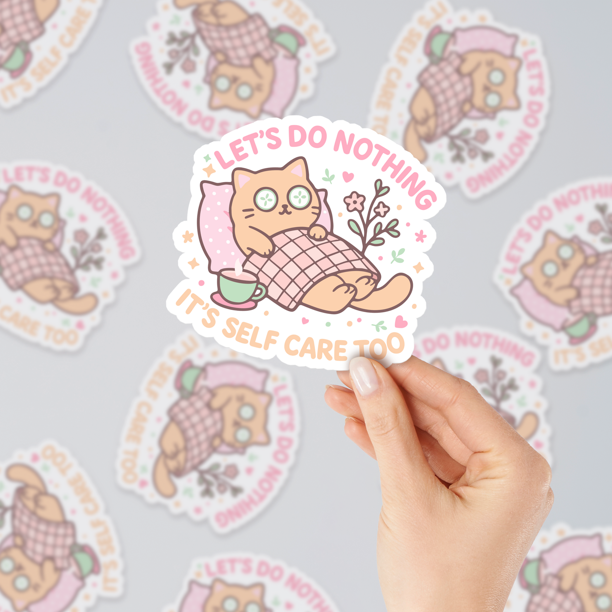 RubiBloom pastel cat sticker next to laptop keyboard — cute kawaii quote design promoting rest and mental wellness, perfect small gift for cozy aesthetic girls.