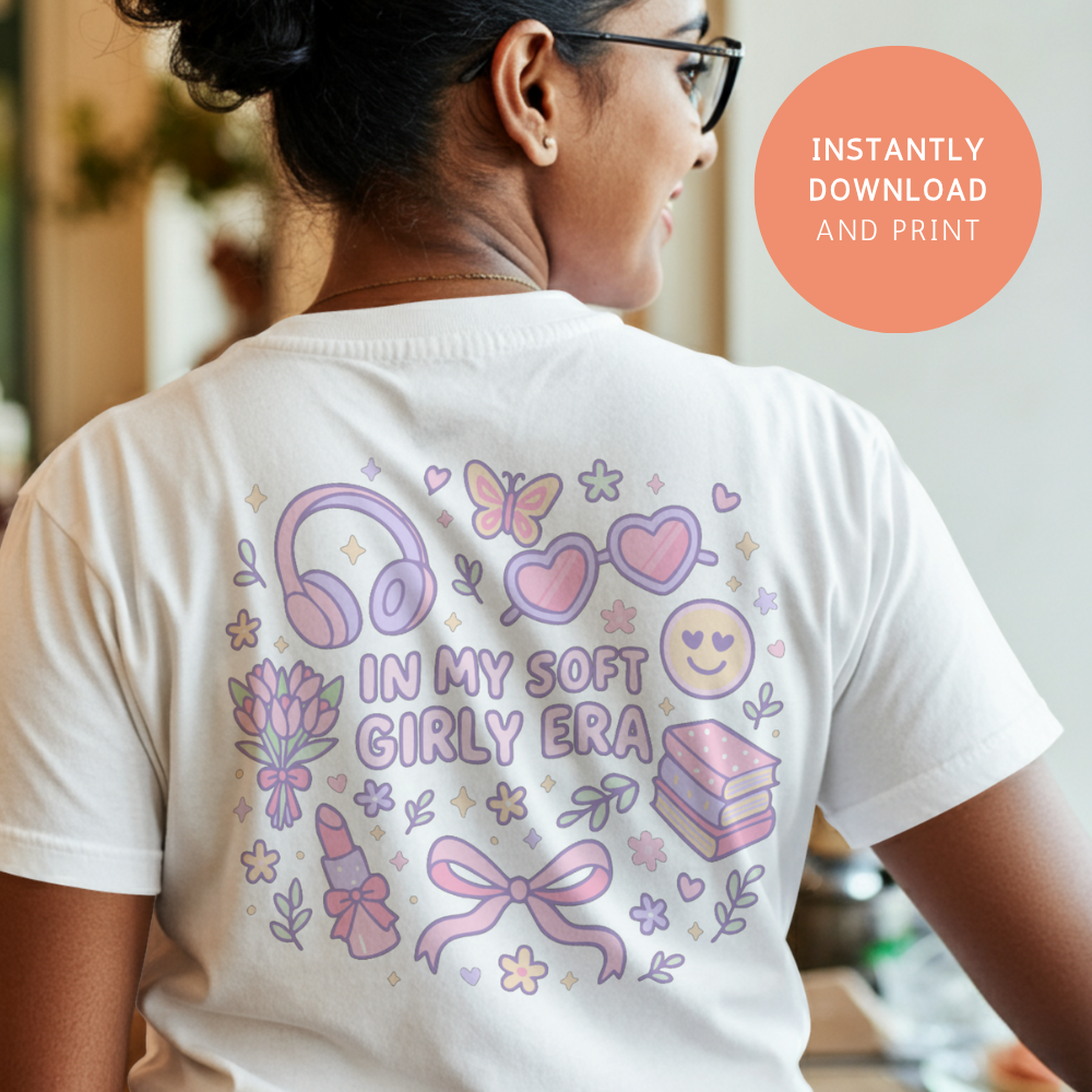 Woman wearing a white t-shirt with “In My Soft Girly Era” pastel design printed on the back. Perfect example of how this cute girly printable PNG & SVG looks on clothing, ideal for cozy and aesthetic outfits.